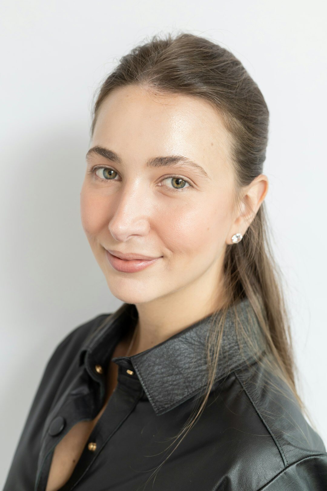 Studio portrait of a smiling European woman professional