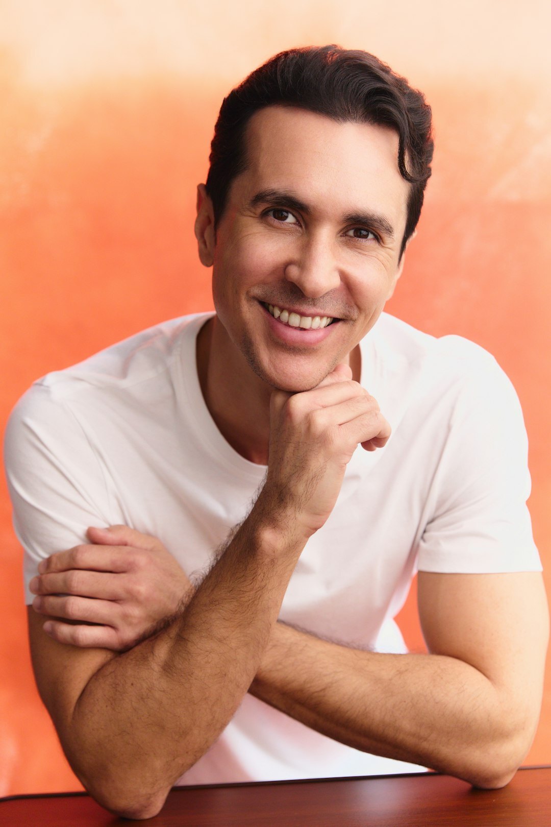 Studio portrait of a smiling European man professional