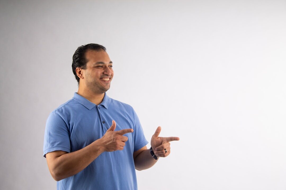 Studio portrait of a male communication trainer